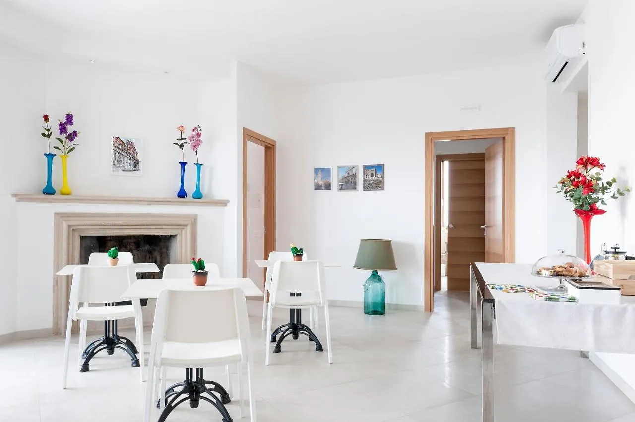לינה וארוחת בוקר Ultimo Piano B&B לצ'ה